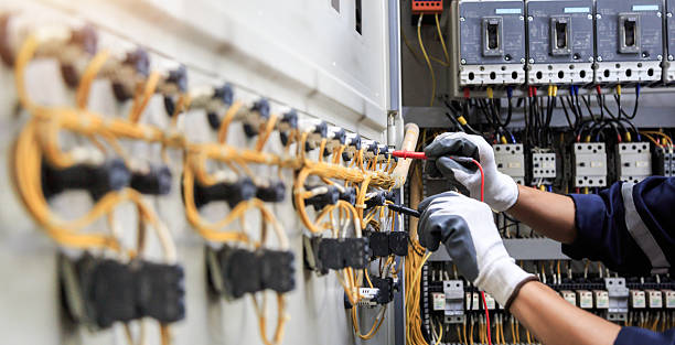 Professional Electrical Panel Upgrade technician working in Linn County County, MO